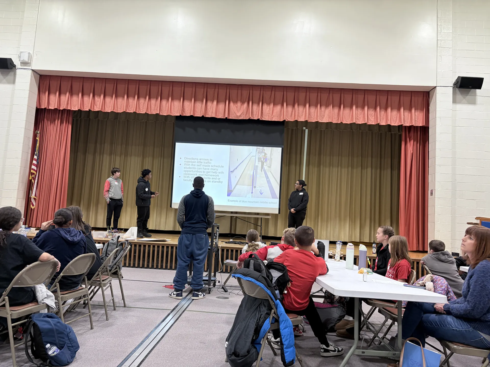 Teams collaborating at a STEM competition